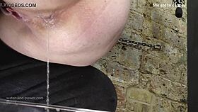 why is she bound on her knees for this high volume enema blast?