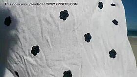 asian slut jj pleasures herself on the sandy beach