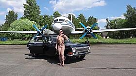 Soviet Plane Black Volga And Nude Model Pose
