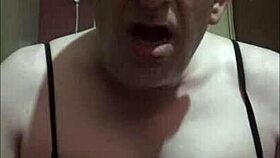 bisexual crossdressing sissy faggot shoots cumshot with strap-on dildo in ass, wishing for real cock.