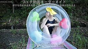 woman inflates float with air fetish style