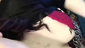 A brunette babe clamps her nipples in close-up detail.