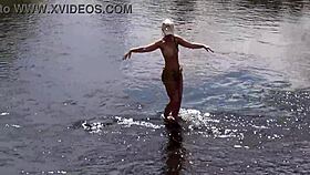 Russian mature woman bathing nude outdoors, revealing her alluring form