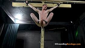 i'm a crucified twink fuckin myself with a dildo on the cross