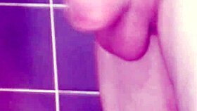 a gay guy jerks off in the bathroom, spanking his ass and cumming hard
