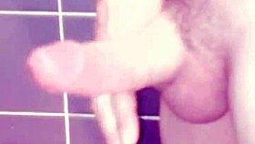 a gay guy jerks off in the bathroom, spanking his ass and cumming hard