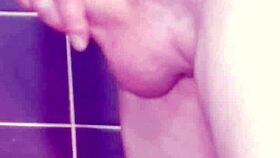 a gay guy jerks off in the bathroom, spanking his ass and cumming hard