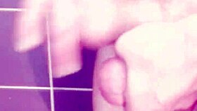 a gay guy jerks off in the bathroom, spanking his ass and cumming hard