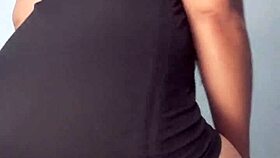 young girl dancing in mini dress with plug teasing her ass