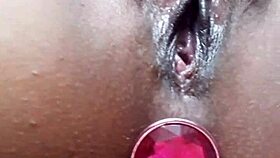 young girl dancing in mini dress with plug teasing her ass