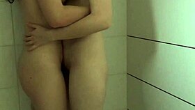 Lesbians knock and play with pink dildo in bathroom. 😈