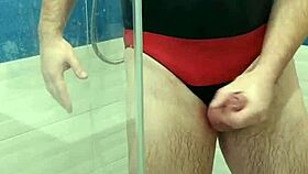 Transsexual Mistress in Adidas Swimsuit Teases with Panties and Thong