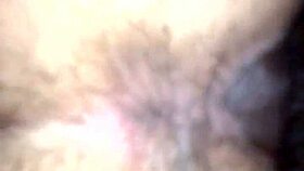 A couple explores interracial doggystyle bent over in the bedroom.