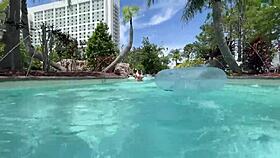 Big tit blonde teases pussy in public pool