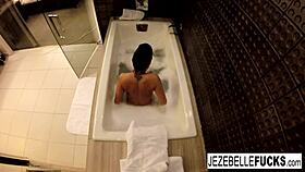 jezebelle bond films her big tits and pussy masturbation in the bath