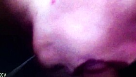 She lounges on the sofa, her big tits bouncing as she sucks him off in a casual tale of pleasure