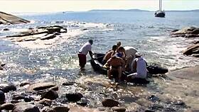 i watch beautiful blonde milf fucking three guys on the beach