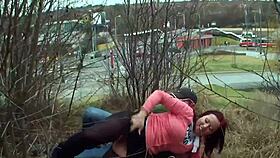 Watching a redhead with perfect tits piss outdoors in public