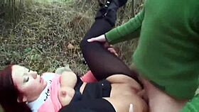 Watching a redhead with perfect tits piss outdoors in public