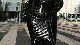 Frisky women in tight latex and tall boots tease hard