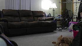 Chubby woman in shorts cleans the house