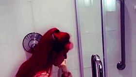 Randalin using a large dildo in her video