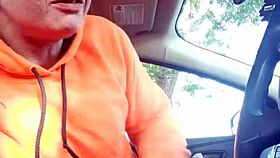 Street whore gives car blowjob with tits and ass exposed.