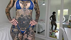 Melody radford tries on metallic dark blue micro bikini at home