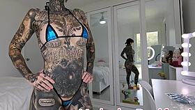 Melody radford tries on metallic dark blue micro bikini at home