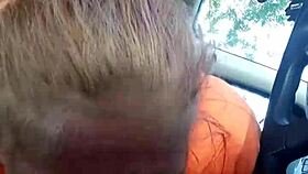 Street whore gives car blowjob with tits and ass exposed.