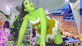 grinch in costume dances in split