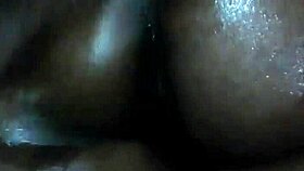 rubbing body oil on a black milf during a relaxing massage