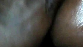 rubbing body oil on a black milf during a relaxing massage