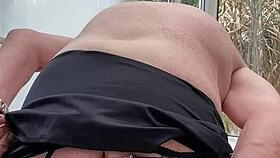 wearing stockings with suspenders while wanking