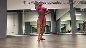 Huge ripped female bodybuilder tears her clothes