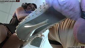 barefoot mistress has him by the balls with her feet