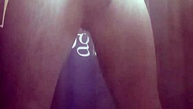 She enjoys a relaxing solo bath in the shower, playing around.