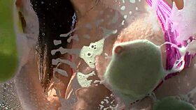 shy brunette with natural tits gets bent over for doggystyle on the sofa, ending with a facial cumshot