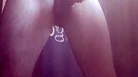 She enjoys a relaxing solo bath in the shower, playing around.