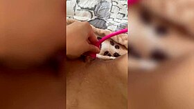 watch her masturbate close up with that big pink dildo