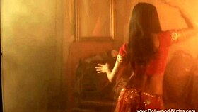 Sexy brunette belly dancer performs nude teasing routine in indian style