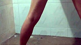 A horny latina prostitute masturbates in the shower, squirting passionately.