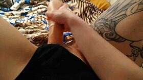 Babe enjoys self-pleasure with dildo