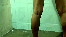 A horny latina prostitute masturbates in the shower, squirting passionately.