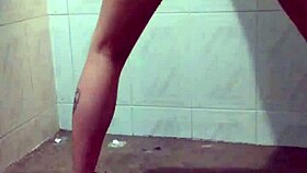 A horny latina prostitute masturbates in the shower, squirting passionately.