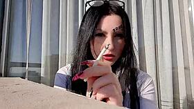 Dominatrix Nika Blows Smoke Seductively!