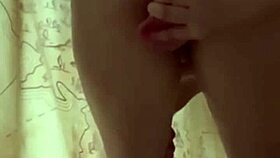 laina marie plays with shower head