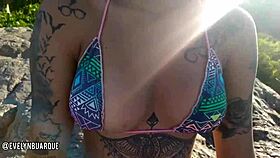 Amateur girl masturbates pussy on public Florianópolis beach