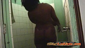 busty ebony lesbians getting wet and wild in a steamy shower together