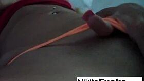 Hot milf Nikita Von James in solo fishnet action, showing her big tits and pussy.